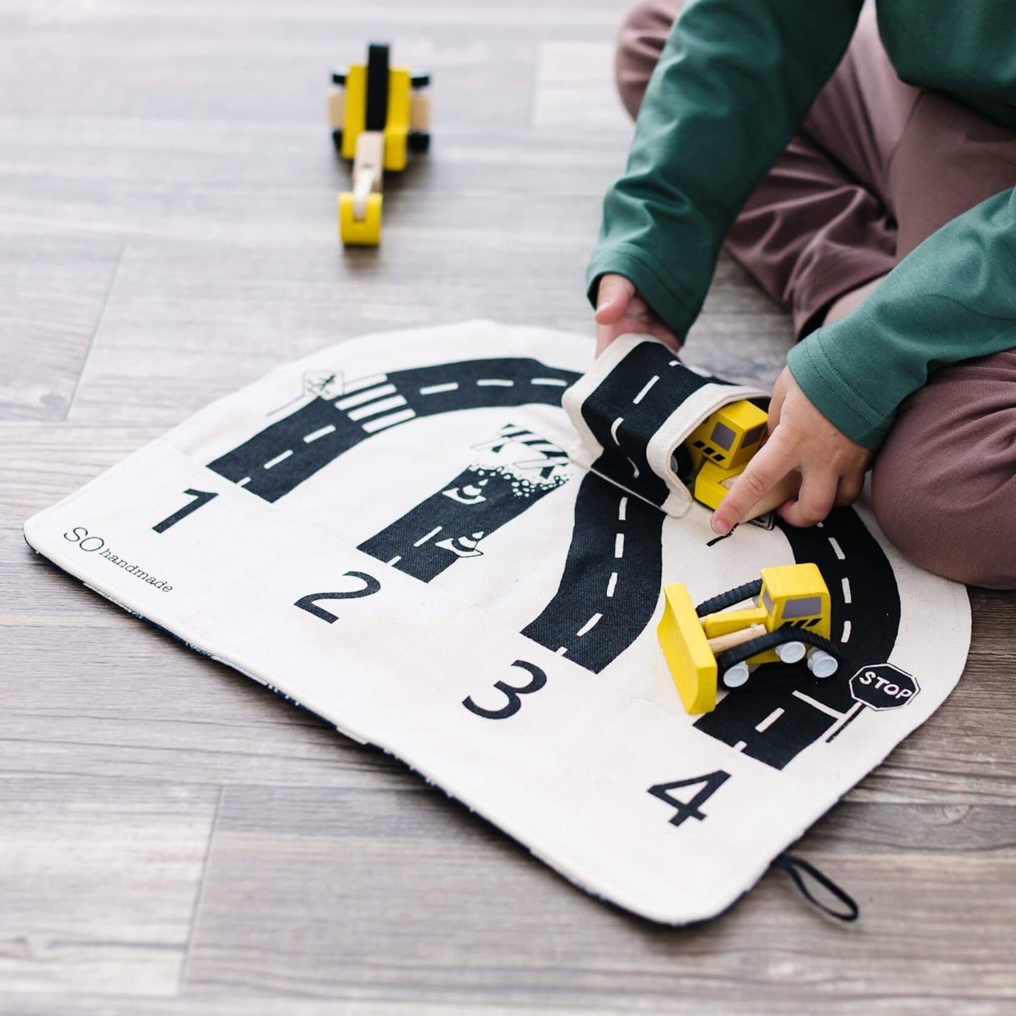 Car Play Mat: "The fun mat is so easy to travel with!" - Chickadees Wooden Toys