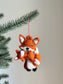 Fox holding baby Ornament