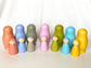 Wooden Nesting Dolls with Pegs Pastel